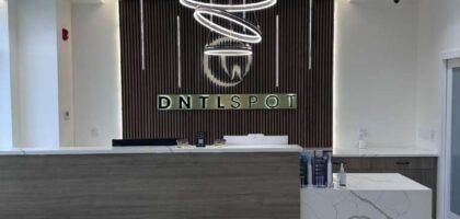Modern dental front desk and reception area at DNTL SPOT in Hewlett, NY.