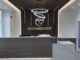 Modern dental front desk and reception area at DNTL SPOT in Hewlett, NY.